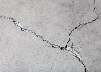 Why It's Better to Remove a Concrete Driveway before Laying Asphalt Grand Rapids Asphalt Paving