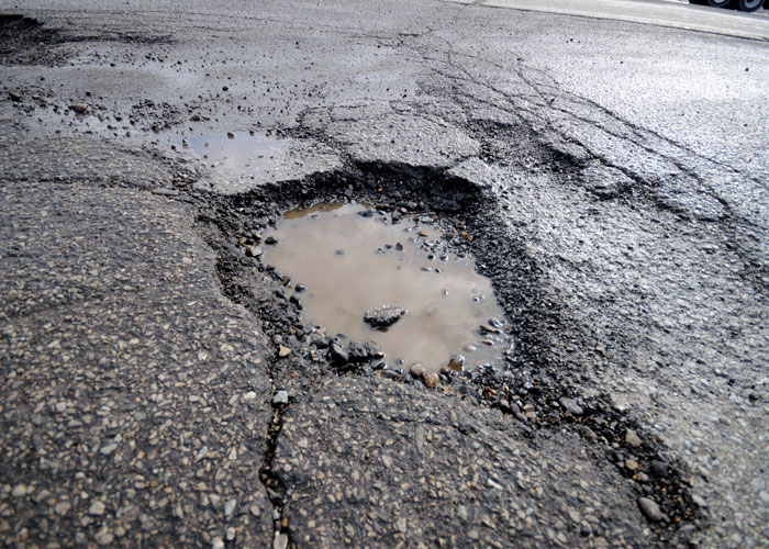 Why Asphalt Driveways Pothole in the Winter Grand Rapids Asphalt